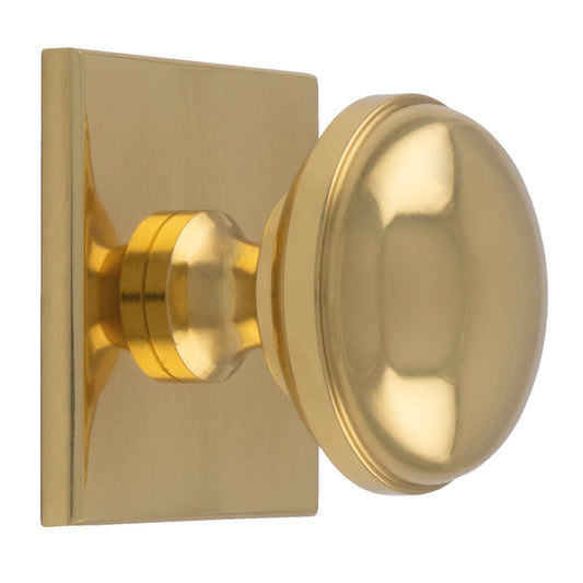 WARWICK KNOB ON SQUARE BACKPLATE - POLISHED BRASS -