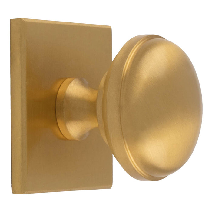 WARWICK KNOB ON SQUARE BACKPLATE - SATIN BRASS -